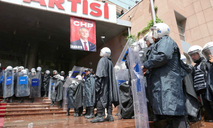 Turkish police force ousted opposition  out of headquarters as crisis deepens